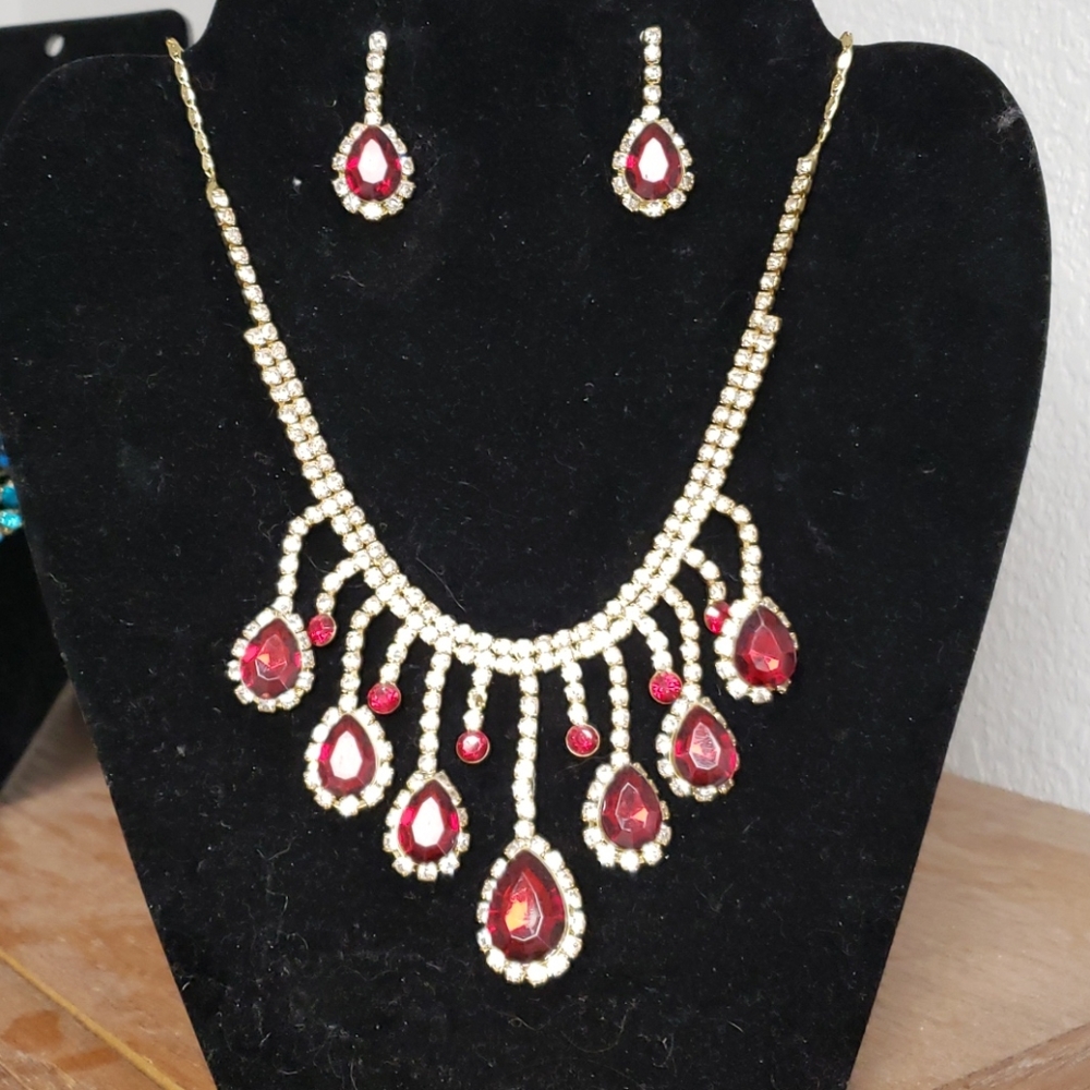 Gold and red stone necklace and earrings